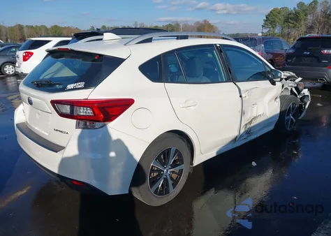 2021 Subaru Impreza Premium 5-Door z USA, uszkodzony, nr VIN 4S3GTAV62M3714094